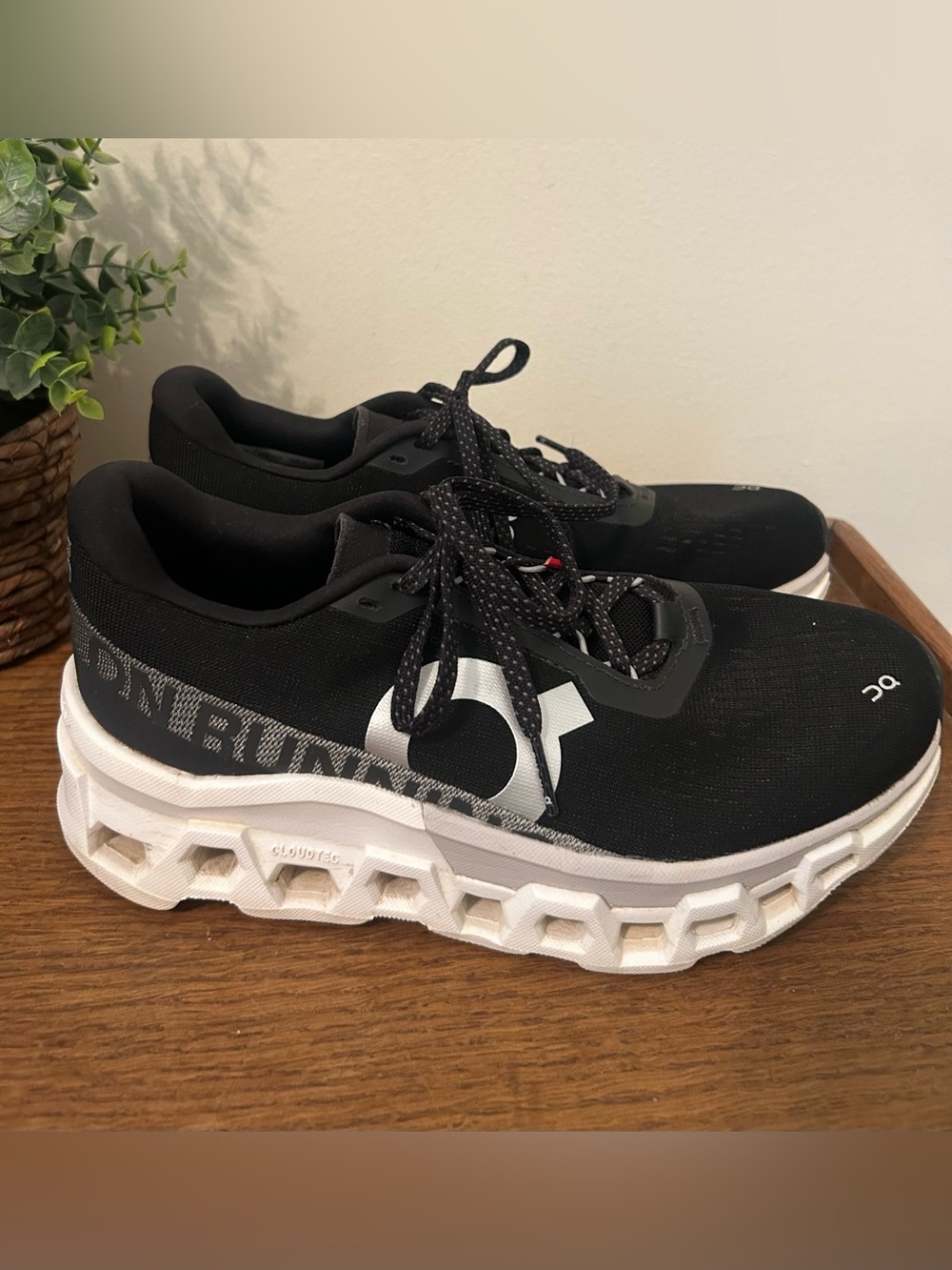 On Running Women's Black and White Cloudnova Athletic Shoes